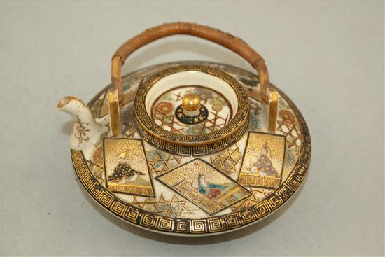 A Japanese Satsuma pottery tea or wine pot, 11.5cm. diam., rim chips